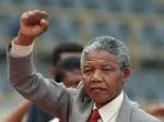 Nelson Mandela raising the freedom fist