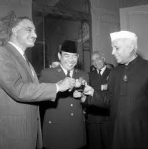 Nasser, Sukarno, and Nehru celebrating the success of the conference in 1955